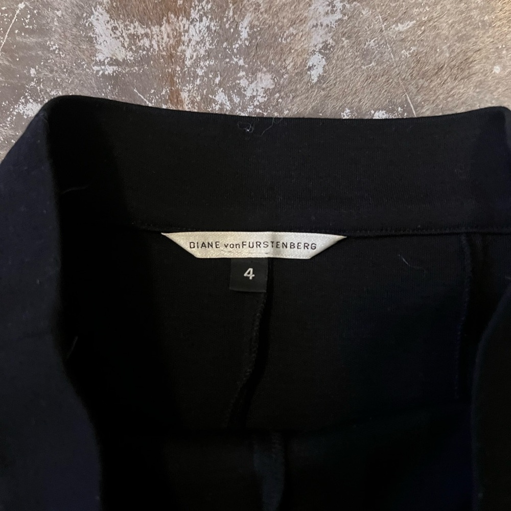 Vintage Black DVF work skirt, kick flair at the knee